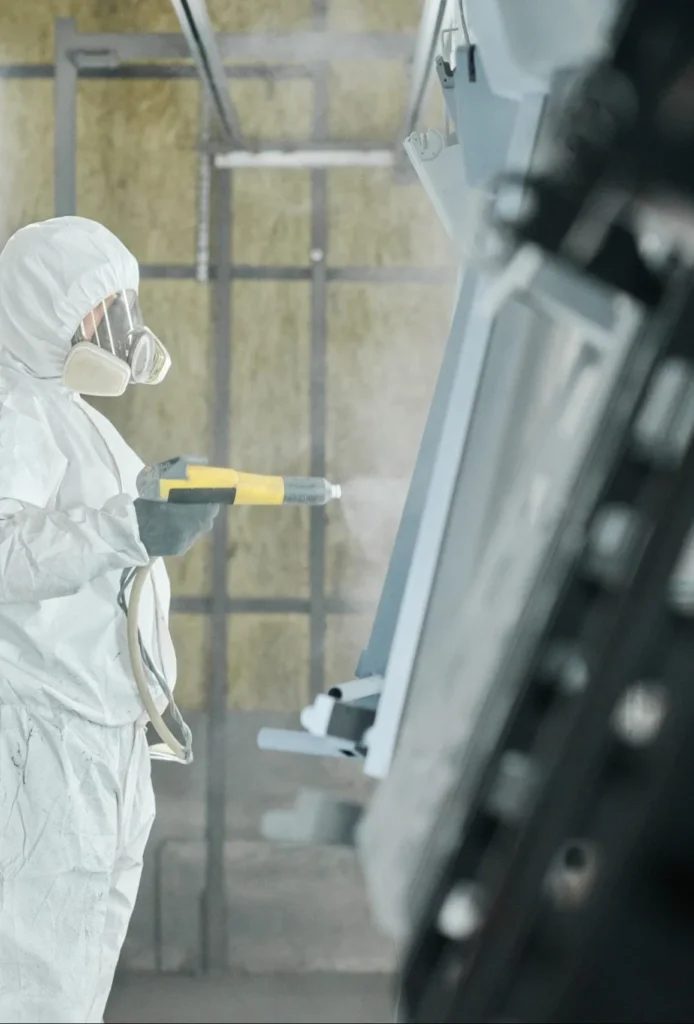 worker in protective wear painting details 2022 07 13 21 34 13 utc scaled e1677836448930